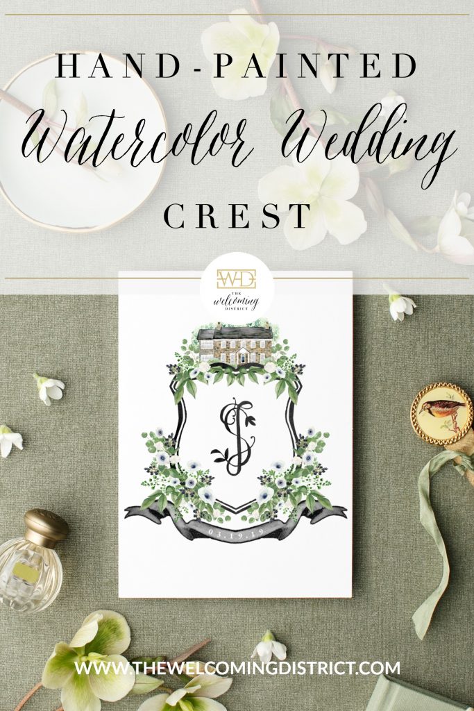 A custom watercolor wedding crest by Alicia Betz of The Welcoming District. This black, green, and white crest features the white anemone and roses and eucalyptus with black hypericum berries floral. Featured on top is the Virginia wedding venue, Tranquility Farm in Purcellville.