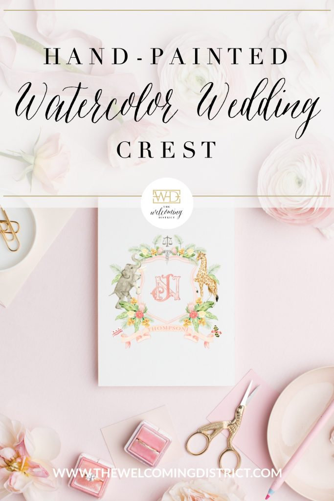 Hand-painted watercolor wedding crest by Alicia Betz of The Welcoming District featuring tropical flowers, a giraffe, and elephant for Hindu and Catholic ceremonies!