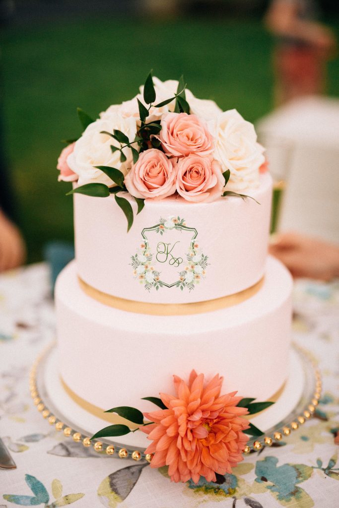 A watercolor wedding crest printed on icing for a beautiful wedding cake! The crest was painted by Alicia Betz of The Welcoming District.