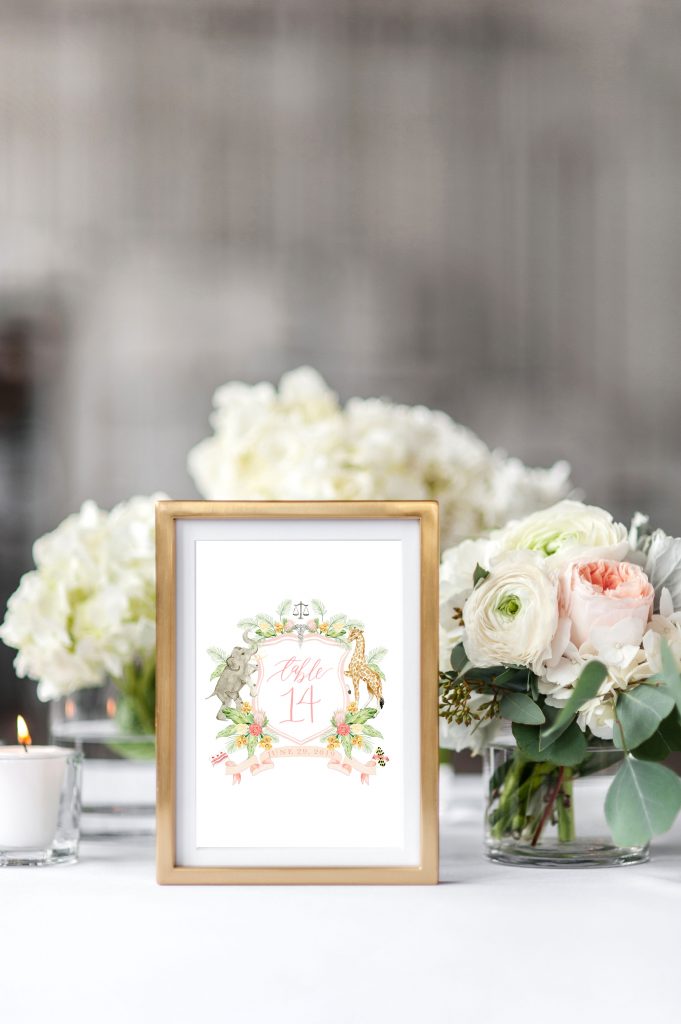 A watercolor crest used as the perfect way to greet guests to their table! This crest was transformed into table numbers and looks perfectly pretty in every way! Watercolor crest by Alicia Betz of The Welcoming District.