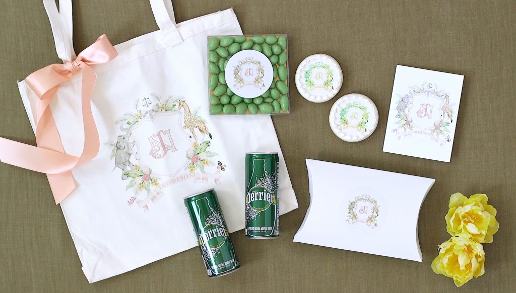 Wedding welcome gift bags featuring a custom watercolor wedding crest by Alicia Betz of The Welcoming District. This pretty welcome was in Old Town Alexandria, VA.