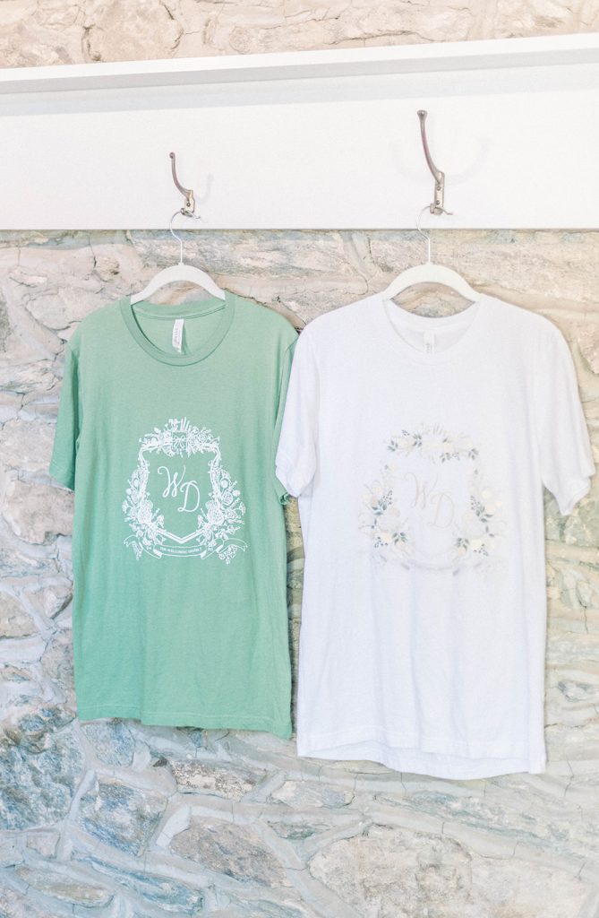 Watercolor wedding crest t-shirts from The Welcoming District at Tranquility Farm in Purcellville, VA.