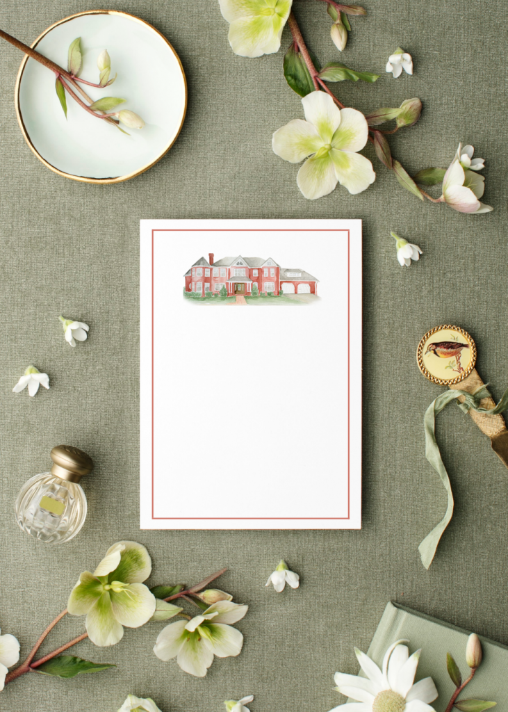 A cute notepad featuring a custom watercolor house painting by Alicia Betz of The Welcoming District.